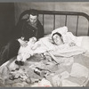 The Ingraham family who share a shack with another family near Alvin, Wisconsin. Mrs. Ingraham is sick in bed