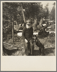 John Nygren and his dog Prince. Nygren lives alone in a shack near Iron River, Michigan