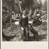 John Nygren and his dog Prince. Nygren lives alone in a shack near Iron River, Michigan