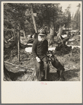 John Nygren and his dog Prince. Nygren lives alone in a shack near Iron River, Michigan