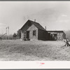 The home of Max Sparks and family near Long Lake, Wisconsin. The family was forced to move from the place they were buying to this shack because of inability to pay three dollars monthly which was the basis of the contract