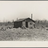 Log cabin occupied by six people. Near Tipler, Florence County, Wisconsin