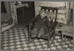 One of Mrs. Bodray's children asleep in their home near Tipler, Wisconsin