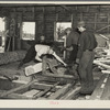 Sawing ties in a sawmill at Gibbs City, Michigan