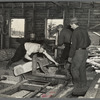 Sawing ties in a sawmill at Gibbs City, Michigan