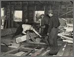 Sawing ties in a sawmill at Gibbs City, Michigan