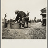 John Bastia doing his washing. He is a single shacker from Iron County, Michigan