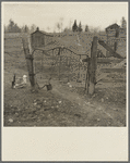 Gate made from the end of an old bed. Alvin, Wisconsin
