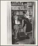 Scene in the first cooperative store in Jersey Homesteads run by Nathan Dubin, Hightstown, New Jersey