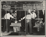 Pressers of work on women's coats in the cooperative garment factory at Jersey Homesteads, Hightstown, New Jersey