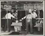 Pressers of work on women's coats in the cooperative garment factory at Jersey Homesteads, Hightstown, New Jersey