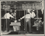 Pressers of work on women's coats in the cooperative garment factory at Jersey Homesteads, Hightstown, New Jersey