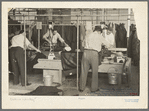 Pressers of work on women's coats in the cooperative garment factory at Jersey Homesteads, Hightstown, New Jersey