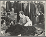 Boris Drasin, president of the workers' Aim Association Inc., works as an operator in the garment factory at a the same wage as the other operators. Hightstown, New Jersey