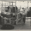 Steam pressing the cloth is one process in manufacturing women's coats at Jersey Homesteads, Hightstown