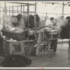 Steam pressing the cloth is one process in manufacturing women's coats at Jersey Homesteads, Hightstown