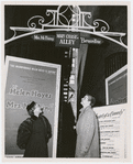 Helen Hayes and Johnny Stewart standing under sign for Mary Chase's Alley on West 48th Street