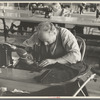 Closeup of cloak operator in cooperative garment factory at Jersey Homesteads, Hightstown, New Jersey