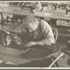 Closeup of cloak operator in cooperative garment factory at Jersey Homesteads, Hightstown, New Jersey