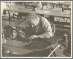 Closeup of cloak operator in cooperative garment factory at Jersey Homesteads, Hightstown, New Jersey