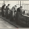 Molding hats in the millinery department of the cooperative garment factory at Jersey Homesteads