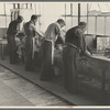 Molding hats in the millinery department of the cooperative garment factory at Jersey Homesteads