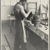 Molding hats in the millinery department of the cooperative garment factory at Jersey Homesteads