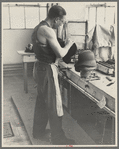 Molding hats in the millinery department of the cooperative garment factory at Jersey Homesteads