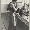 Molding hats in the millinery department of the cooperative garment factory at Jersey Homesteads