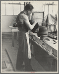 Molding hats in the millinery department of the cooperative garment factory at Jersey Homesteads