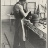 Molding hats in the millinery department of the cooperative garment factory at Jersey Homesteads