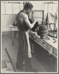 Molding hats in the millinery department of the cooperative garment factory at Jersey Homesteads