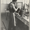Molding hats in the millinery department of the cooperative garment factory at Jersey Homesteads