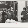 Group of men on 7th Avenue and 28th Street, New York City