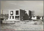 New type of two-story house under construction. Stucco coat has just been applied, Jersey Homesteads, Hightstown