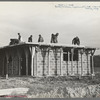 Men working on roof of house under construction, Jersey Homesteads, Hightstown, New Jersey