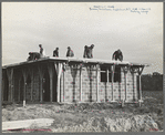 Men working on roof of house under construction, Jersey Homesteads, Hightstown, New Jersey