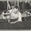 Philip Goldstein, assistant cutter in the cooperative garment factory, Jersey Homesteads, Hightstown, New Jersey