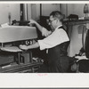Proprietor of tailor shop at steam presser, University Place near 11th Street, New York City