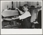 Proprietor of tailor shop at steam presser, University Place near 11th Street, New York City