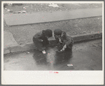 Children playing in the gutter on 139th Street just east of St. Anne's Avenue, Bronx, New York