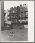 Apartment houses as viewed through vacant lot. In vicinity of 139th Street, just east of St. Anne's Avenue, Bronx, New York City