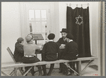 Visiting rabbi teaching the Orthodox religion to children at Jersey Homesteads, New Jersey
