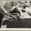 Closeup of cutter's hands (cutting cloth), Jersey Homesteads, Hightstown, New Jersey