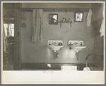 Washroom of Rustan brothers' farmhome near Dickens, Iowa