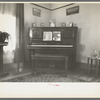 Corner of living room of Rustan brothers' farmhouse near Dickens, Iowa