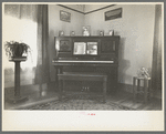 Corner of living room of Rustan brothers' farmhouse near Dickens, Iowa