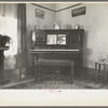 Corner of living room of Rustan brothers' farmhouse near Dickens, Iowa