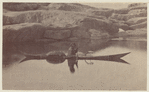 Esquimaux in his kayak or skin boat