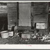 Backyard of shack in "Shantytown," Spencer, Iowa